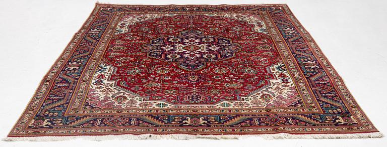 A Tabriz carpet, c. 342 x 245 cm.