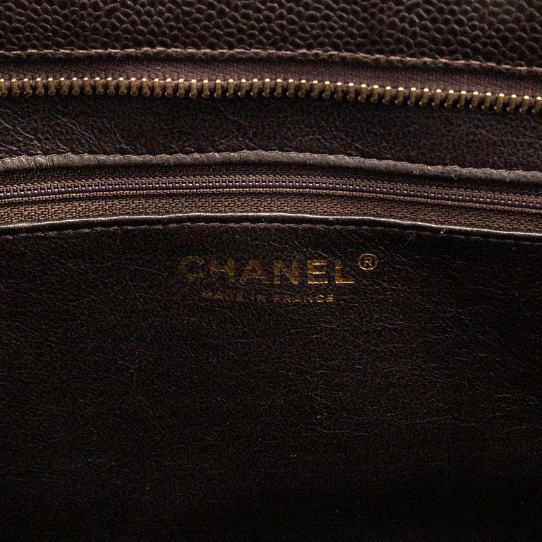 Chanel, a "Medallion Tote" bag.