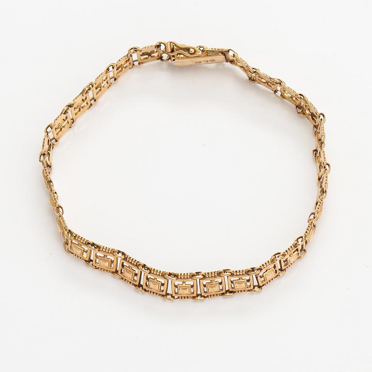 A 14K gold bracelet. Kallion kulta ja kello, Helsinki 1926.