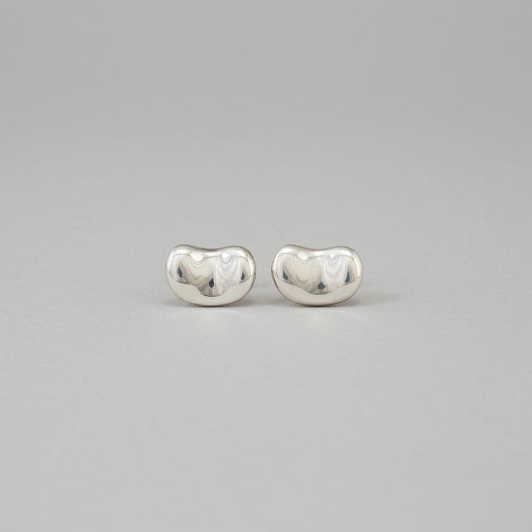 A pair of sterling cufflinks by Elsa Peretti for Tiffany & co.