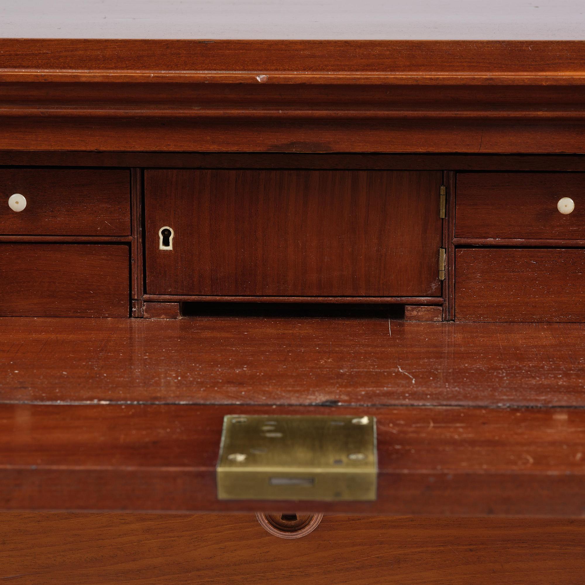 A late Gustavian mahogany writing commode in the manner of I. Löfgren, Stockholm circa 1800.