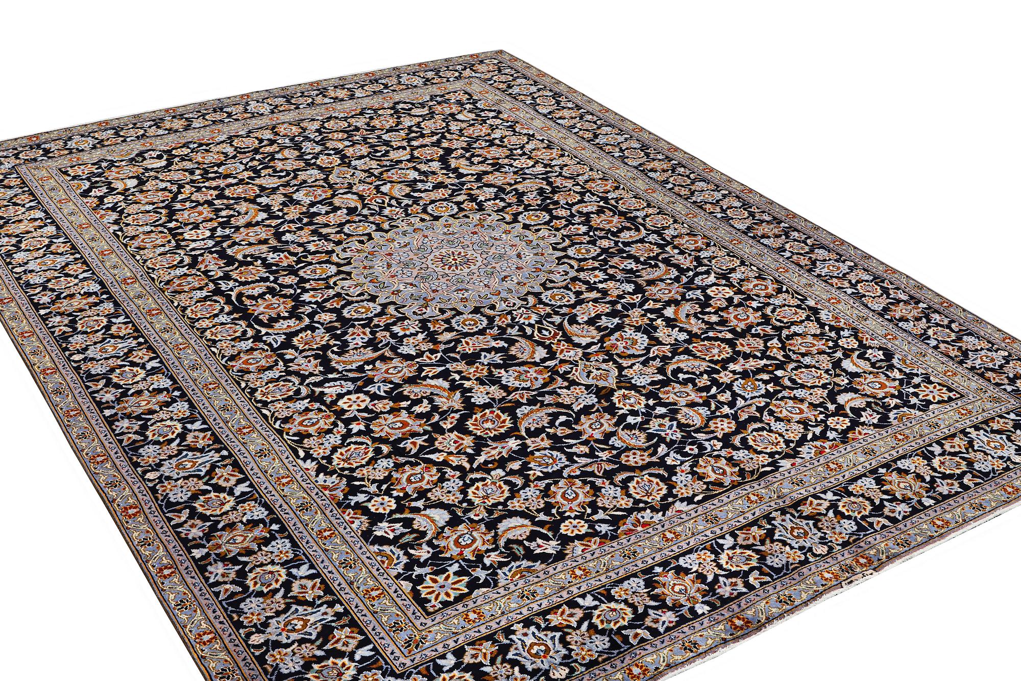 A Kashan carpet, c. 405 x 303 cm.