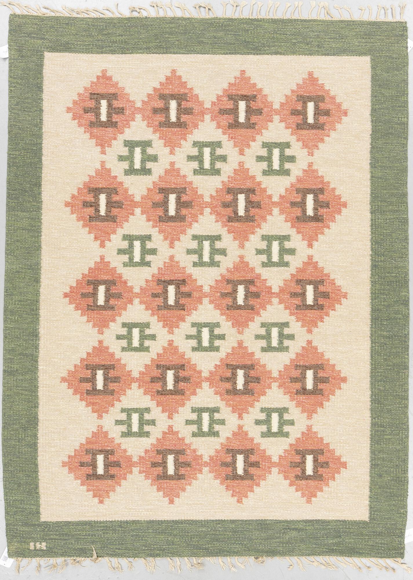 A carpet, flat weave, ca 227,5 x 163,5-168,5 cm, signed IH.