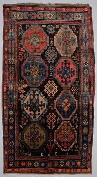 A ANTIQUE KARABAGH CARPET, 247x135 cm.