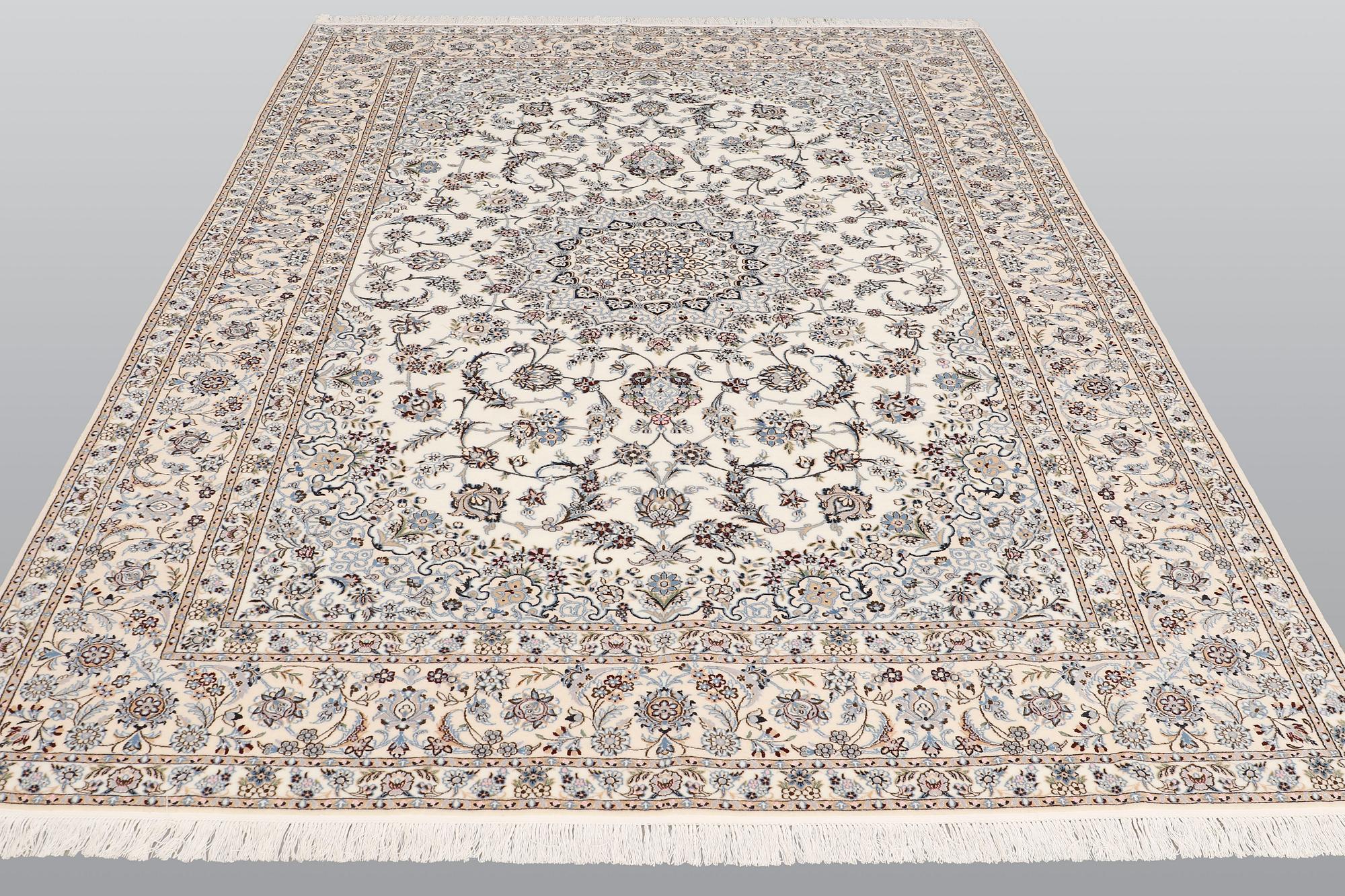 A carpet, Nain part silk s.k 6LAA, ca 310 X 209 cm.