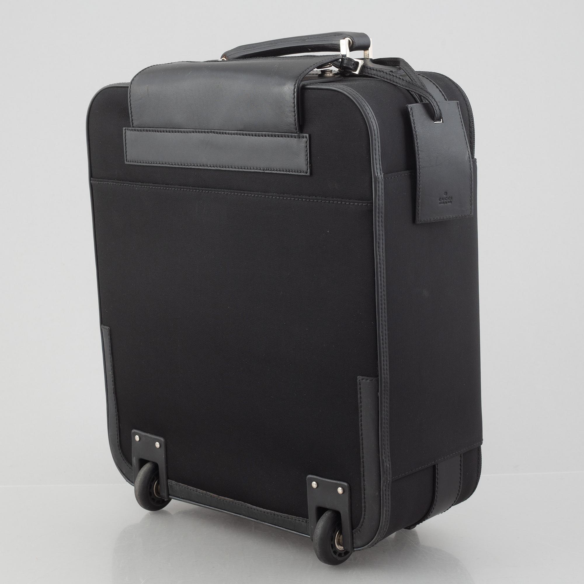 Gucci, suitcase/cabin bag.