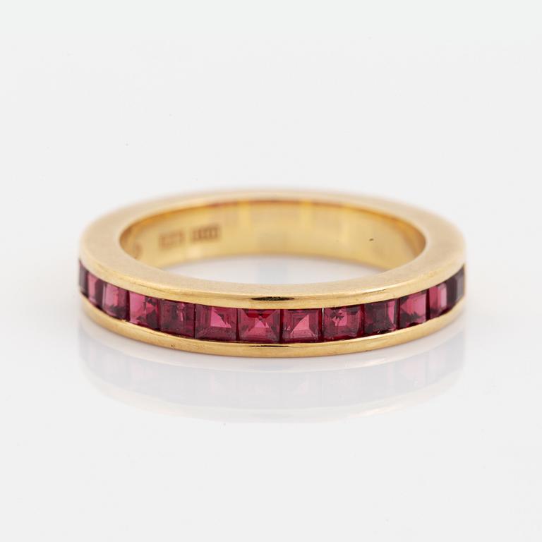 18K gold and step cut ruby ring.