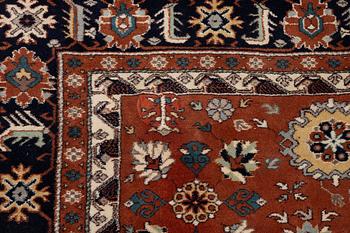 A semi-antique Orientall carpet c. 318 x 202 cm.