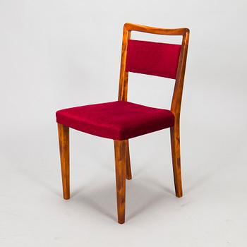 A mid 20th century dining table and a set of four chairs, Oy Boman Ab and two chairs Werner West.