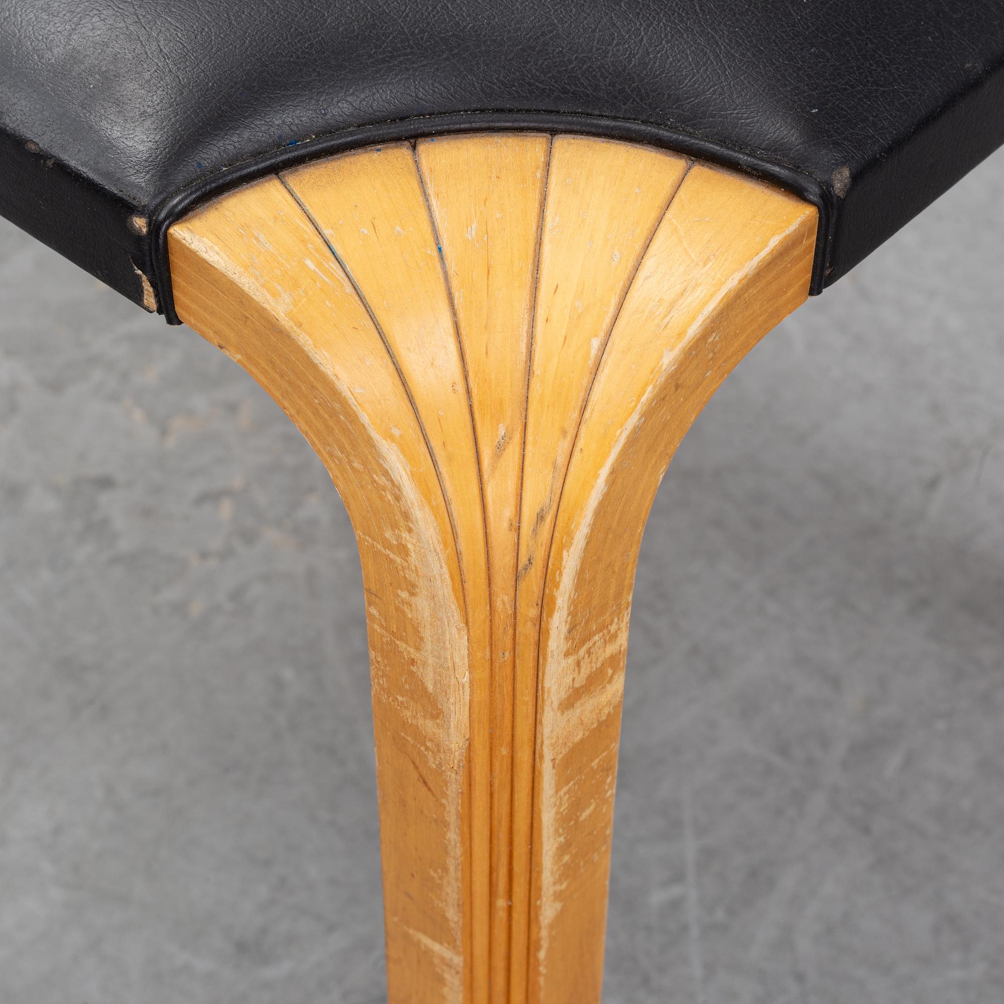 Alvar Aalto, a birch and leather stool, Artek, second half of the 20th century.