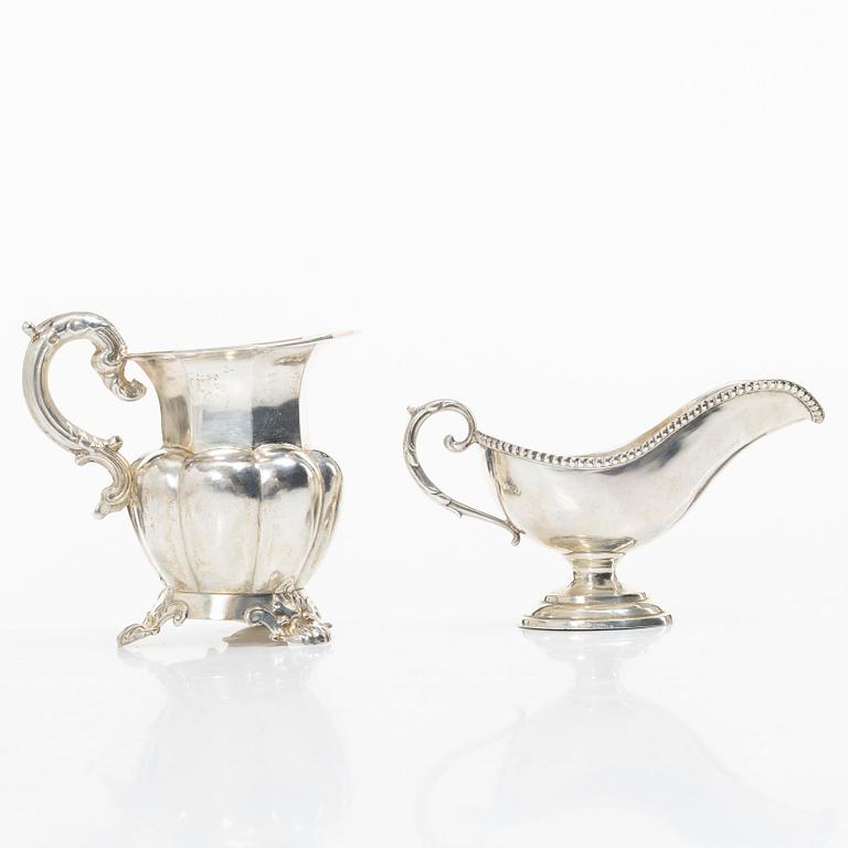A silver gravy boat, Germany, and a silver creamer, johan Petter Tullgren, Sweden, 1857.