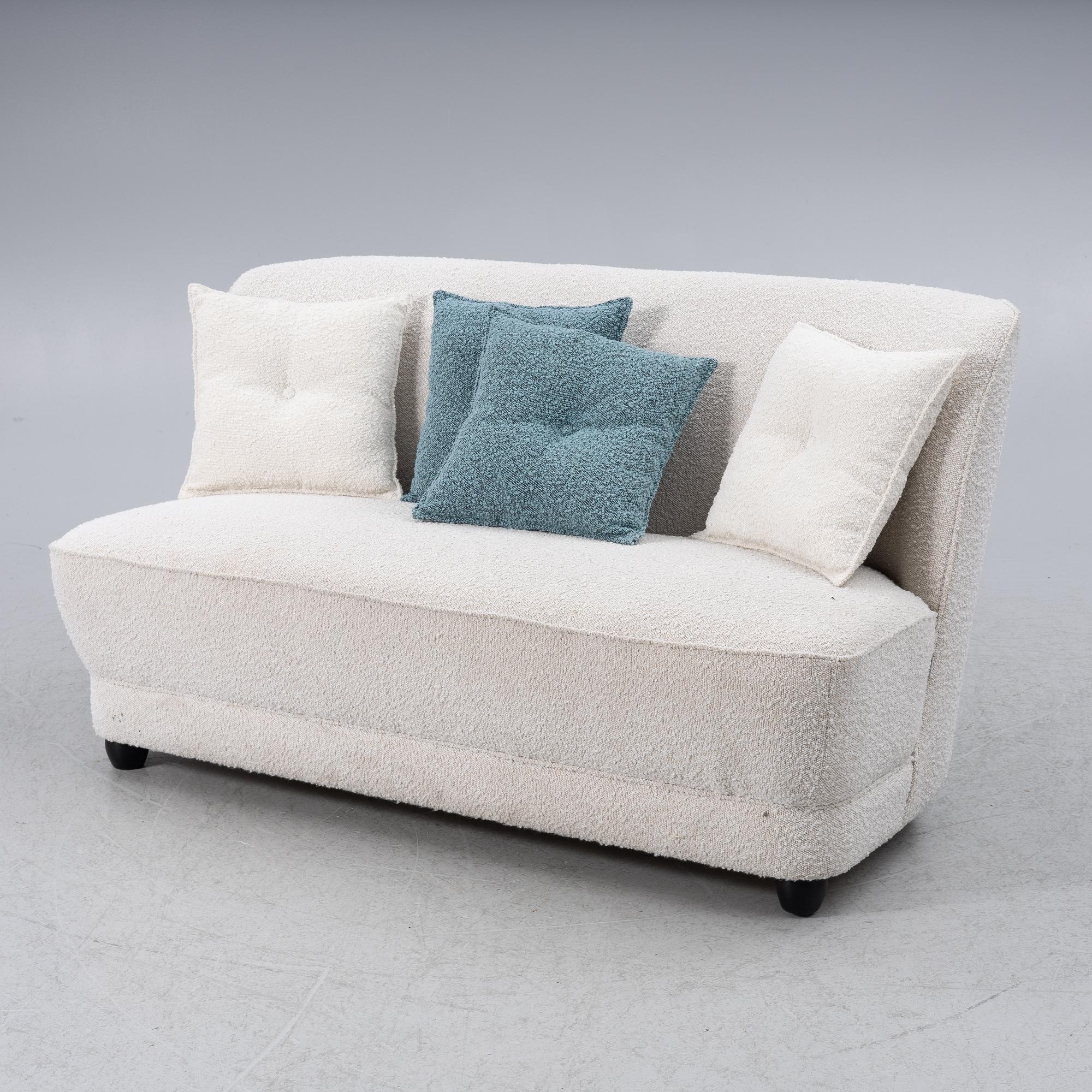 A contemporary sofa and armchair, Boom Interior.