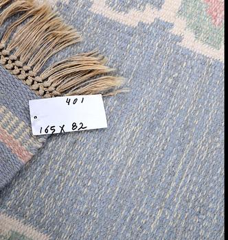 Anna-Johanna Ångström, a flat weave carpet, signed Å, c. 165 x 82 cm.
