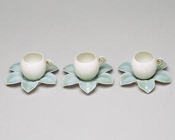 A set of six (3+3) cups with stands, Denmark, Bing & Gröndahl, early 20th Century.