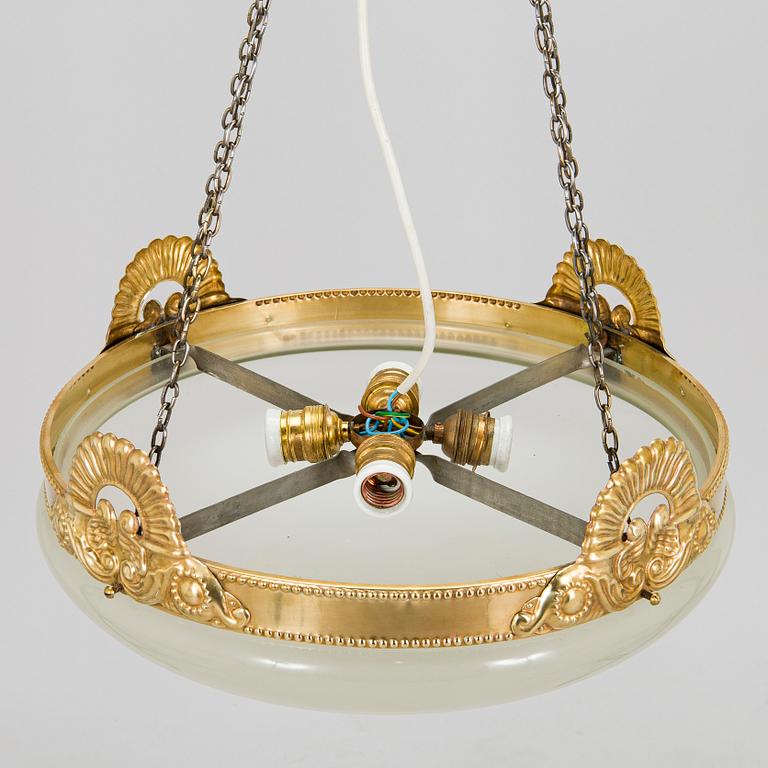 Kattovalaisin, 1900-luvun alku.