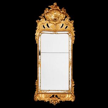 568. A Swedish Rococo mirror dated 1763.