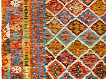 A kilim carpet, approximately 353 x 246 cm.