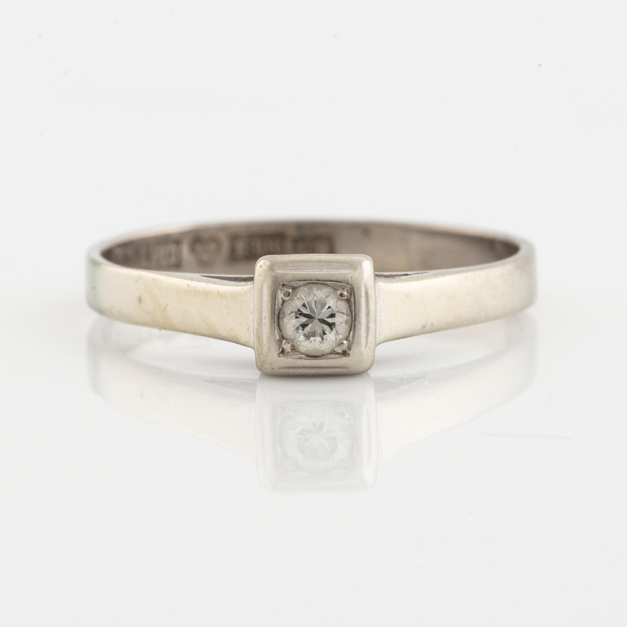 White gold and brilliant cut diamond ring.