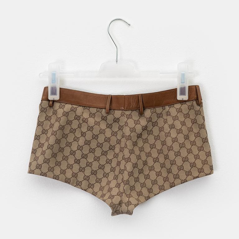 Gucci, a GG supreme jacket and shorts, size 38, 2000.