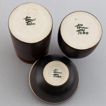 Erich & Ingrid Triller, a glazed stoneware lidded bowl and two vases, Tobo.