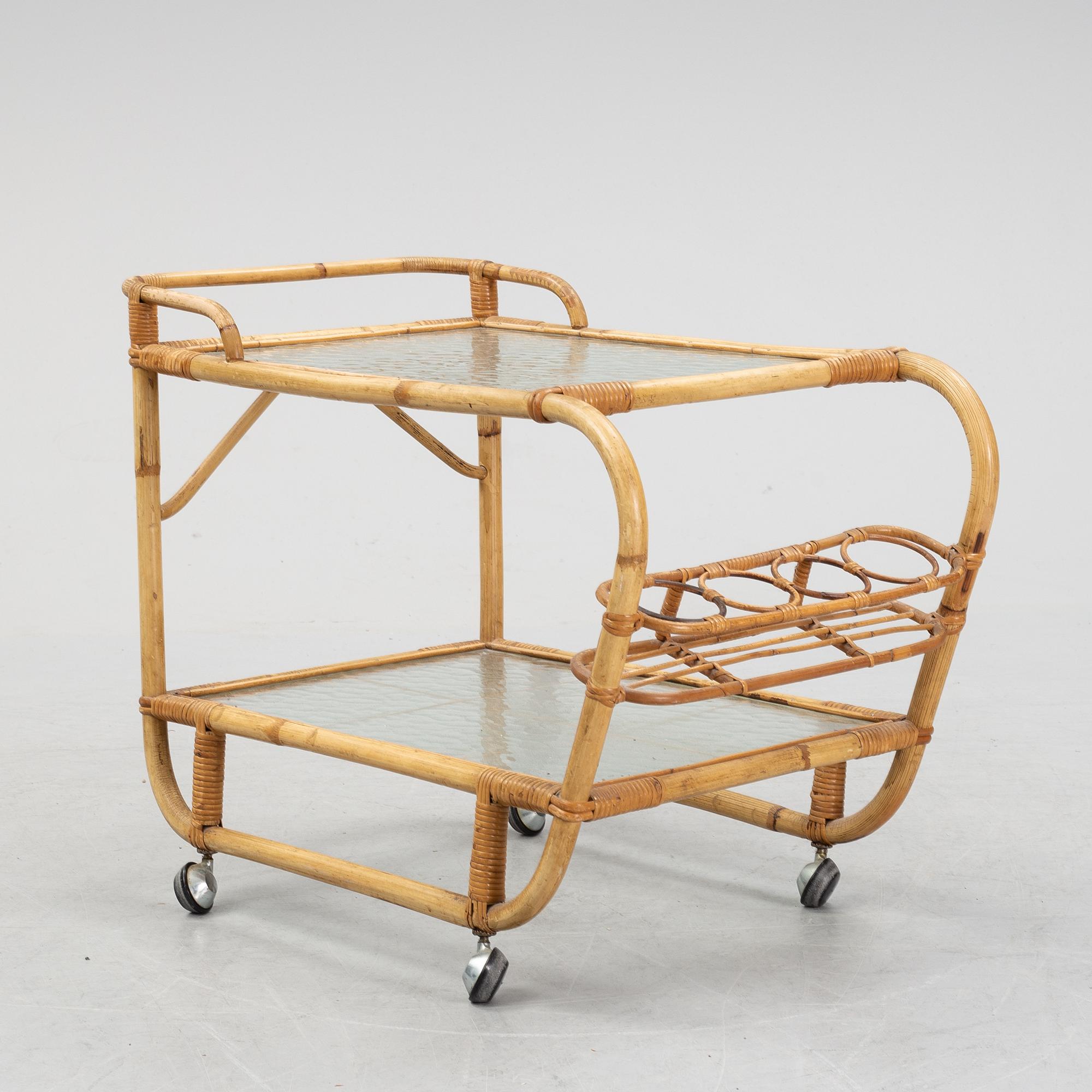 A second half of the 20th century rattan drinks trolley.