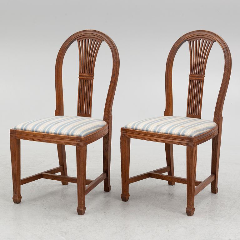 A Dining table and 12 chairs, Jugend, early 20th century.