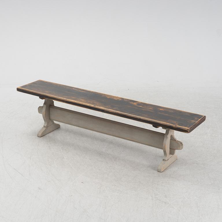 A wooden bench, around 1900.