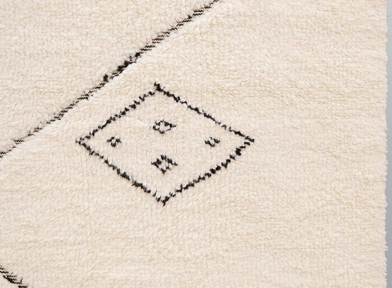 A moroccan carpet, ca 300 x 200 cm.