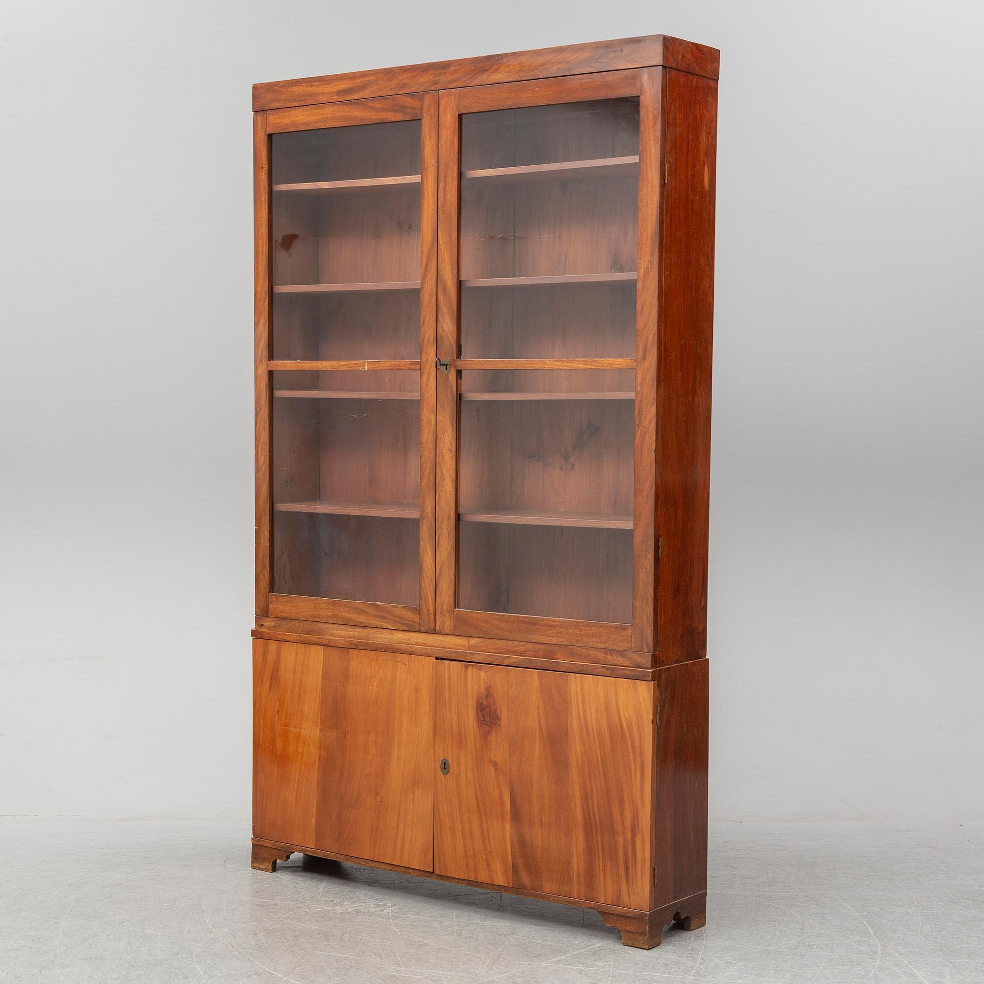 A second half of the 19th century mahogany veneered display cabinet.