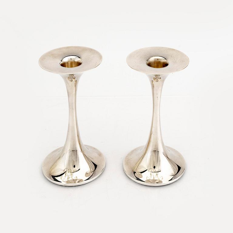 A 20th century pair of silver candel sticks "Trumpetti" marked tapio Wirkkala  2006, Kultakeskus weight 332 grams.