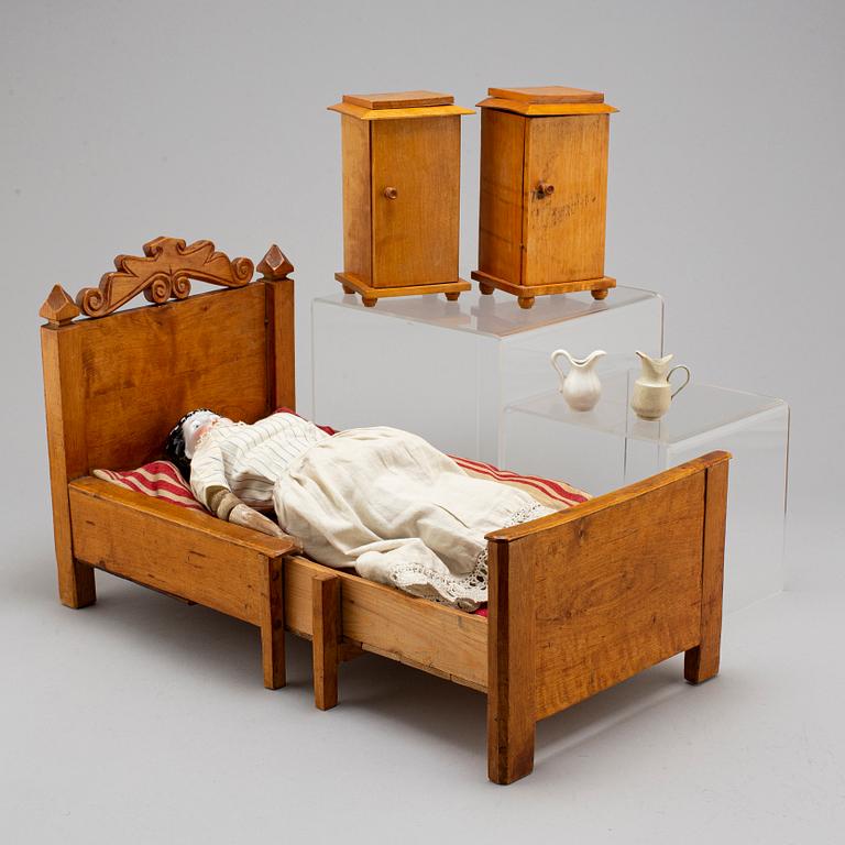 A china head doll and a 3 psc of doll furniture.