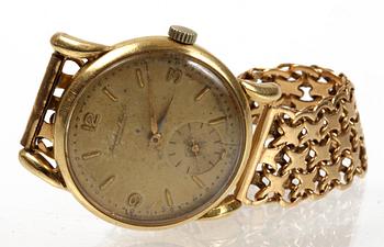 ARMBANDSUR, 18 K guld, EHW, Stockholm, 1947. Tot vikt 68 gr.