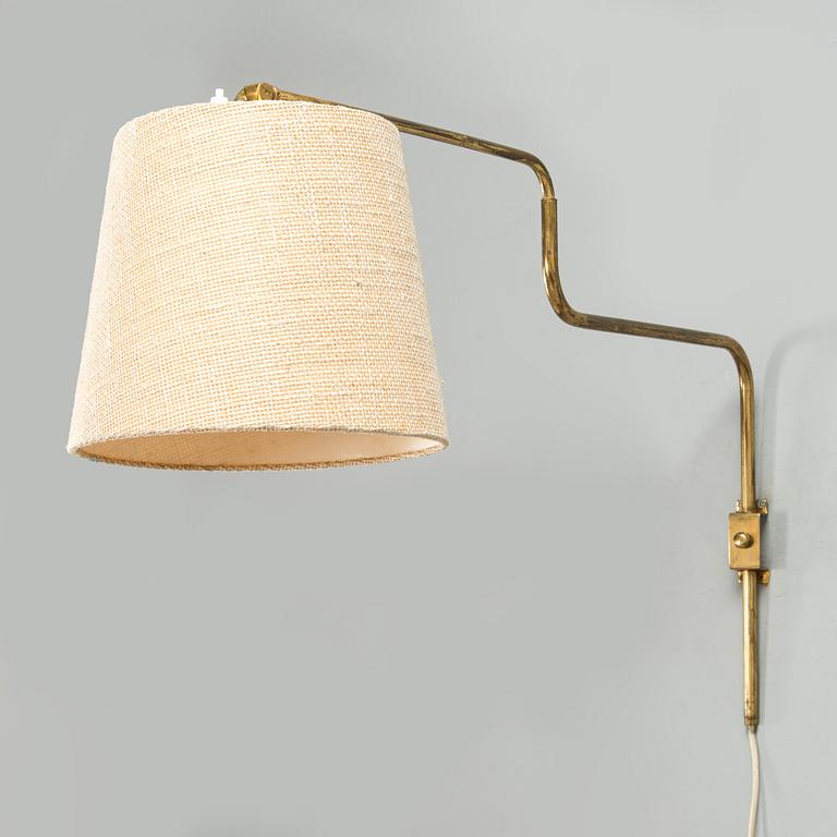 A 1950's wall light for Valinte.