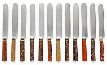 665. Twelve Swedish 19th century porphyry knives.