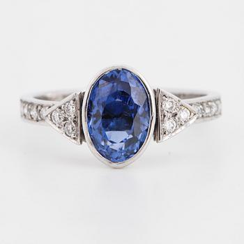 Sapphire and brilliant-cut diamond ring.