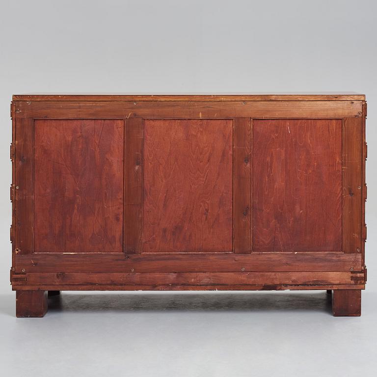 Oscar Nilsson, attributed to, a mahogany chest of drawers, Sweden 1930's.