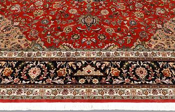 A Tabriz carpet, part silk, so-called 50 Raj, approx. 300 x 300 cm.