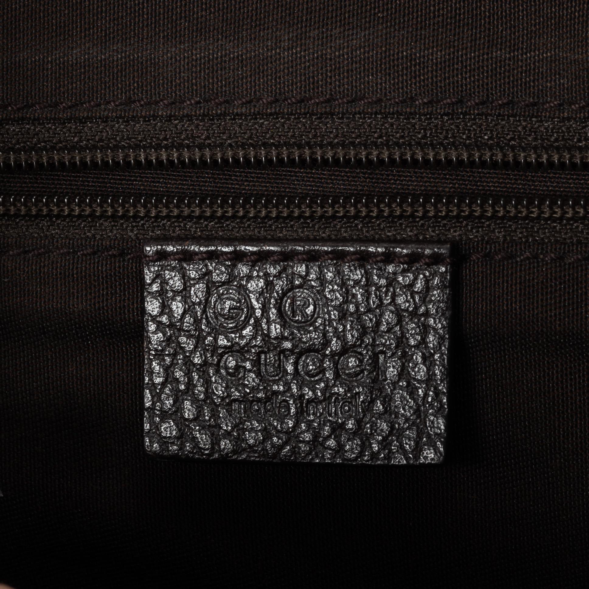 Gucci, GG Supreme bag.