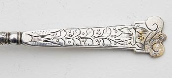 A spoon dated 1658.
