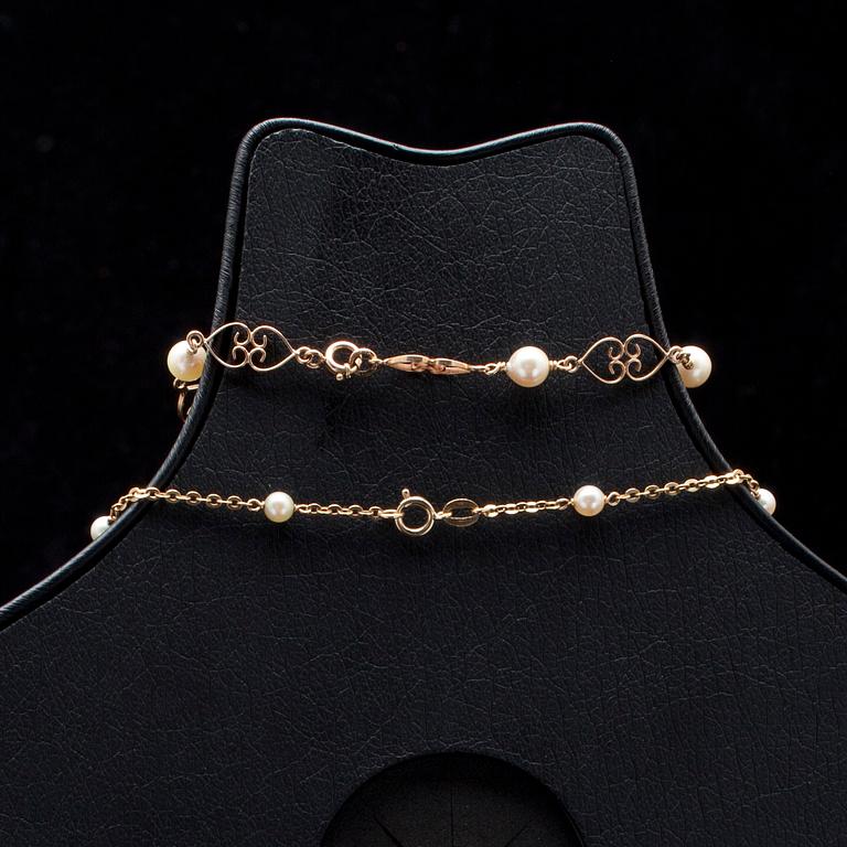 HALSSMYCKE, ARMSMYCKE och ÖRHÄNGEN, guld 14K, pärlor. Vikt tot. 9,7 g.
