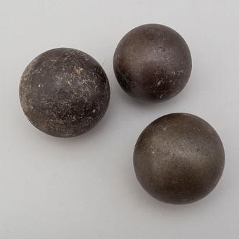 Three 19th century iron balls.