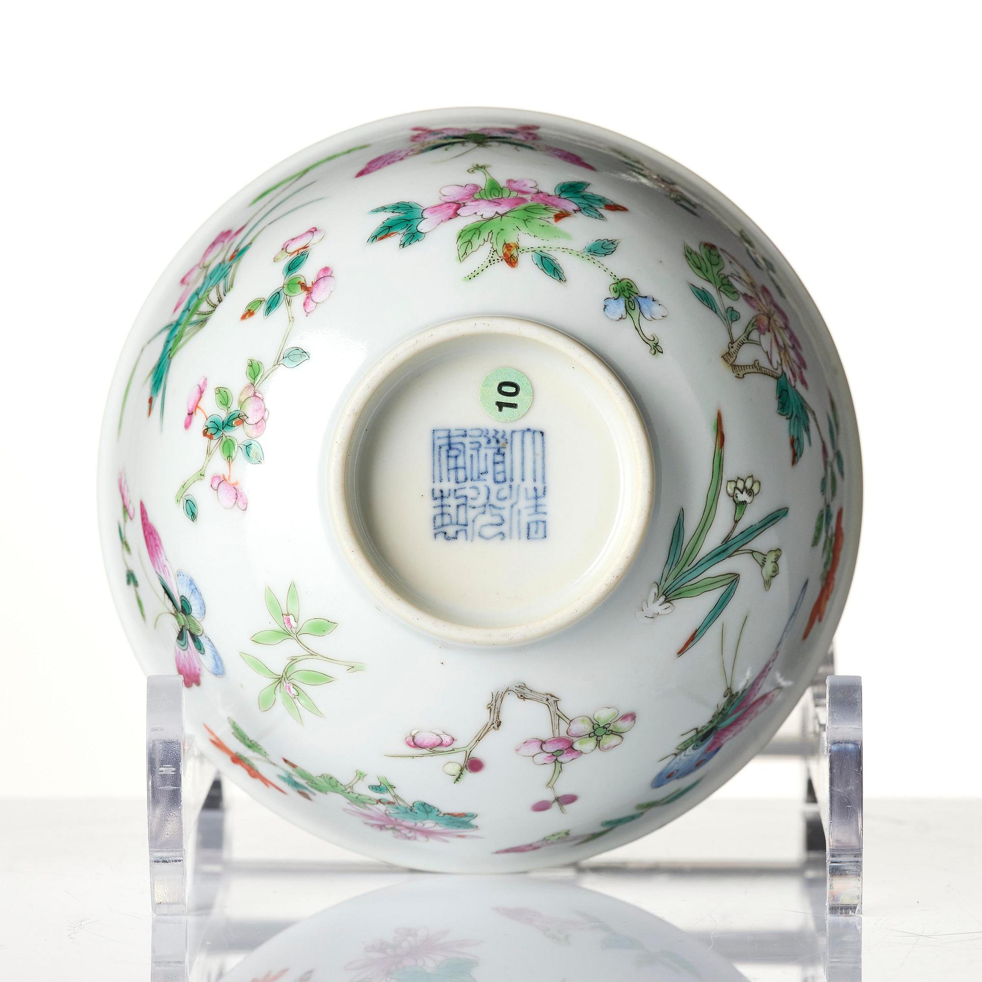 A famille rose 'butterfly' bowl, Qing dynasty with Daoguang mark and of the period (1820-1850).