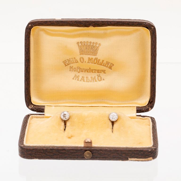A pair of 18K white and red gold shirt buttons set with round old cut diamonds by Emil O. Möller Malmö 1942.