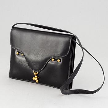 Hermès, a vintage leather bag.