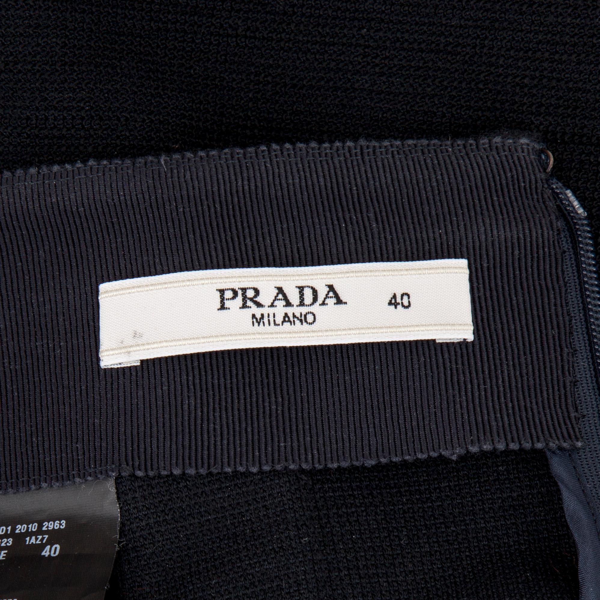 KJOL, Prada.
