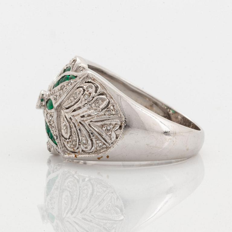 Eight-cut diamond and emerald ring.
