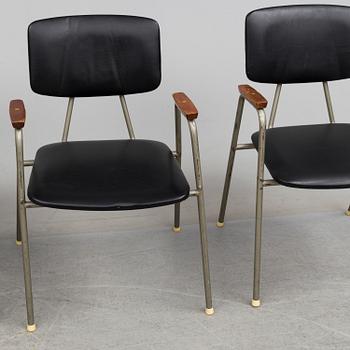 Four tubular steel armchairs, 1950's.