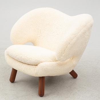Finn Juhl, a' Pelican Chair' armchair, House of Finn Juhl, Denmark.