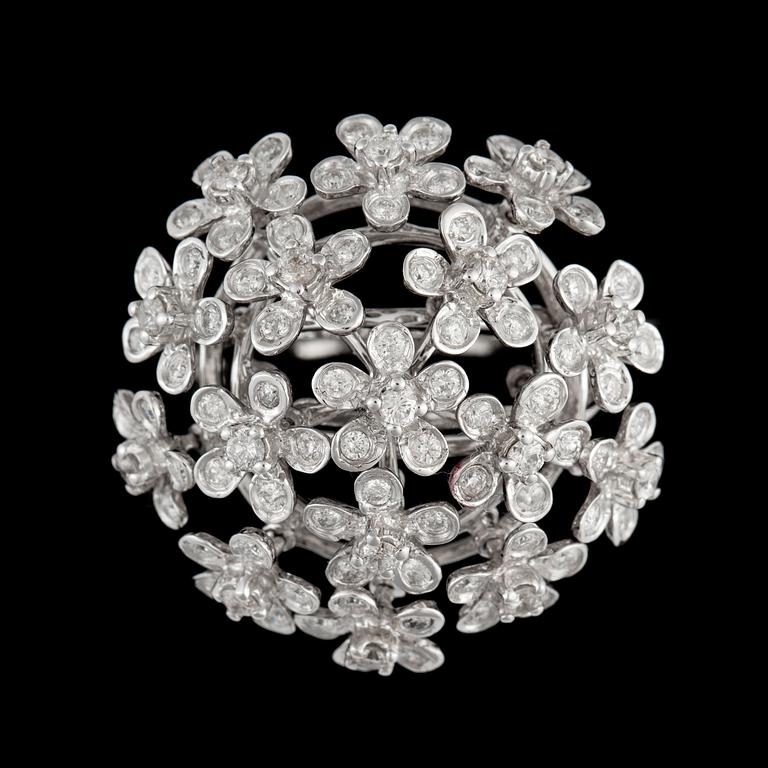 A diamond, 1.29 cts in total, ring. Diamonds in moveable flower settings.