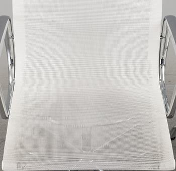 A pair of 'EA 108' desk chairs by Charles & Ray Eames for Vitra.